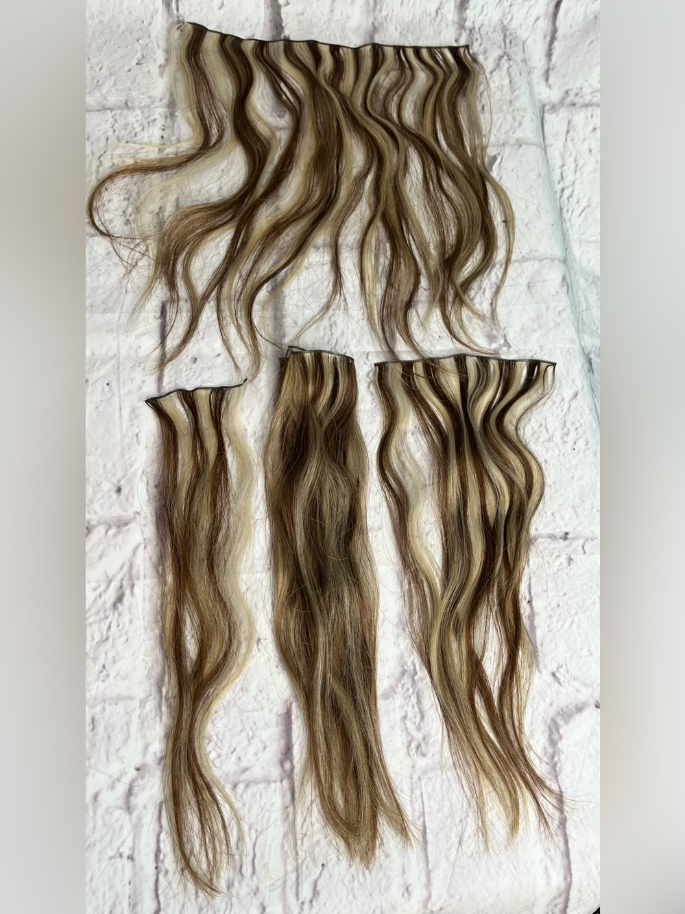 Human hair tie in extensions blonde/medium brown highlights 16in